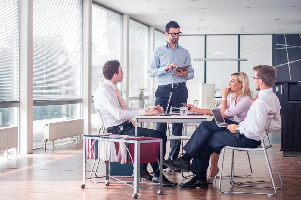 Business people sitting at corporate meeting