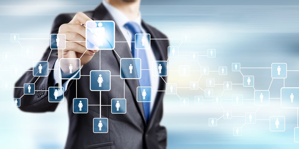 Close up of businessman drawing chain of interaction