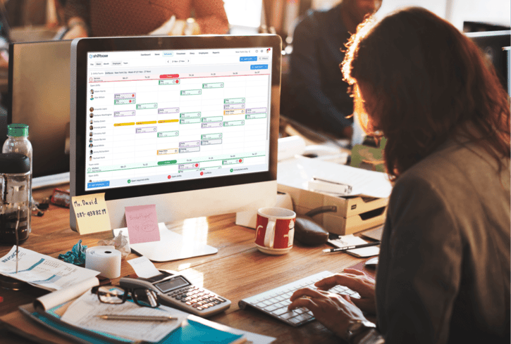 Employee working on Shiftbase planning tool, creating employee shift schedule