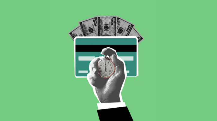 Hand holding stopwatch against cash and card symbolising time card fraud