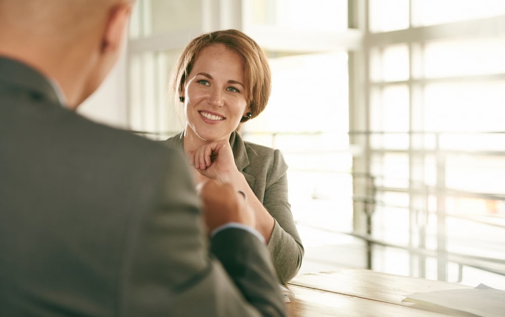 Image of two succesful business people conducting an interview to hire their next employee-1