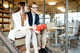 Man and woman during the coffee break in the office suggesting coffee badging at work