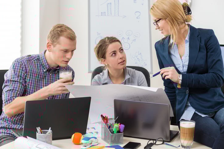 employees communicating to each other about project