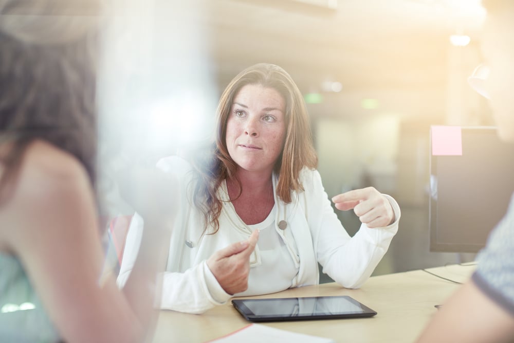 Creative team brainstorming in an open office