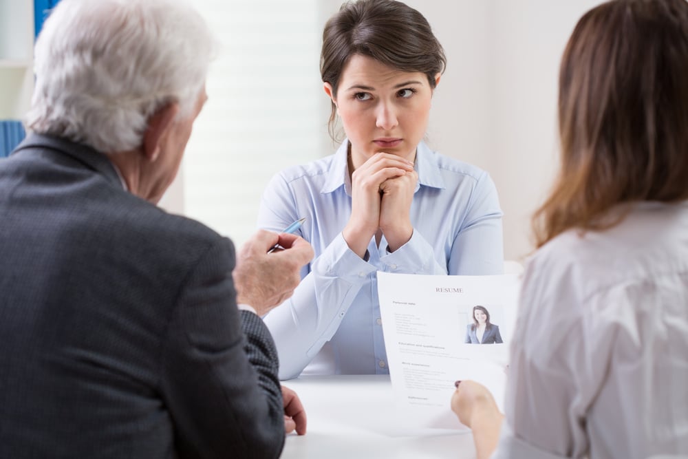 Woman during difficult job interview at a corporation-1