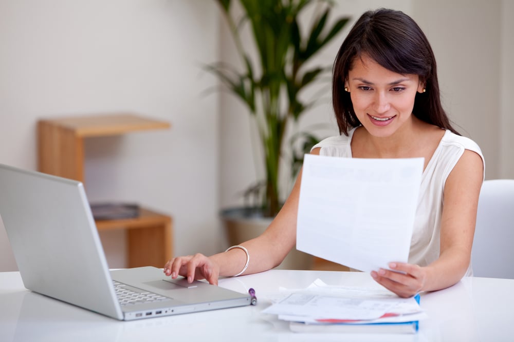 Woman working at home on a laptop computer