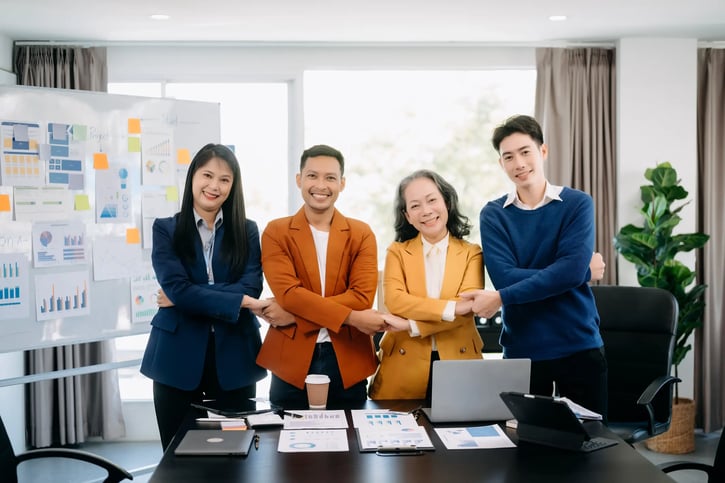 asian family working together symbolising nepotism 
