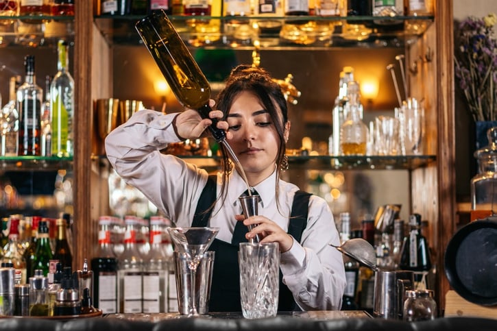 barista preparing cocktail drinks