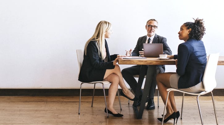 business people in a brainstorming meeting