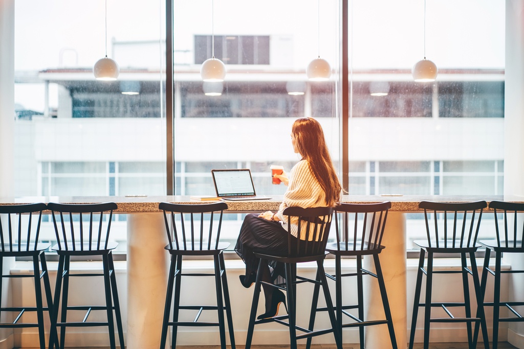 businesswoman-working-in-modern-co-working-