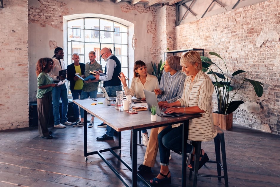 crowd of employees working together developing new ideas and strategies