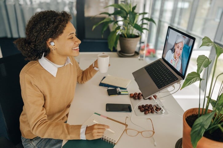employee in meeting while working remote, symbolising remote onboarding