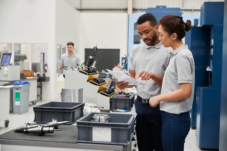 Employee learning new tasks symbolising crossboarding