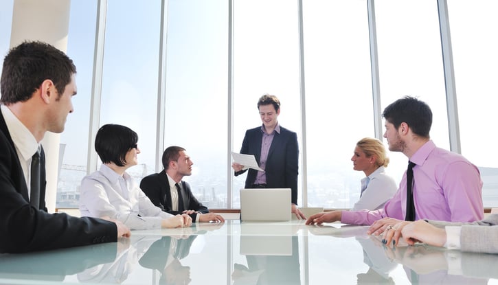 HR professionals collaborating with employees to achieve an optimal HR to employee ratio.