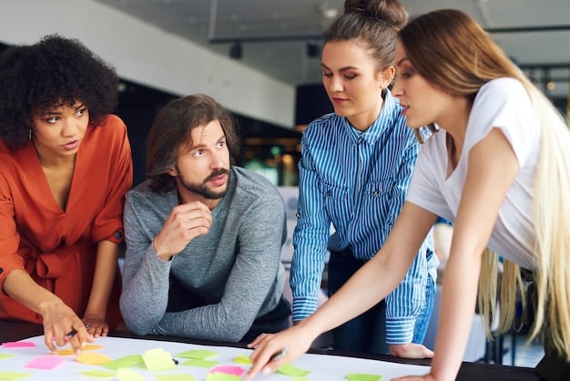 Team in einer Besprechung über Unternehmenskultur-Entwicklung