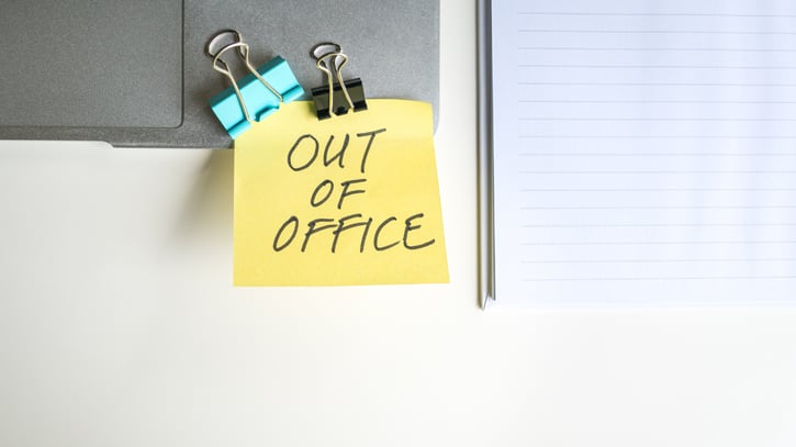 note that says out of office on