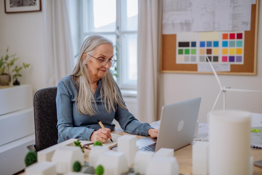 senior-woman-eco-architect-working-on-lapotp-in-of-2022-11-11-09-22-54-utc_50