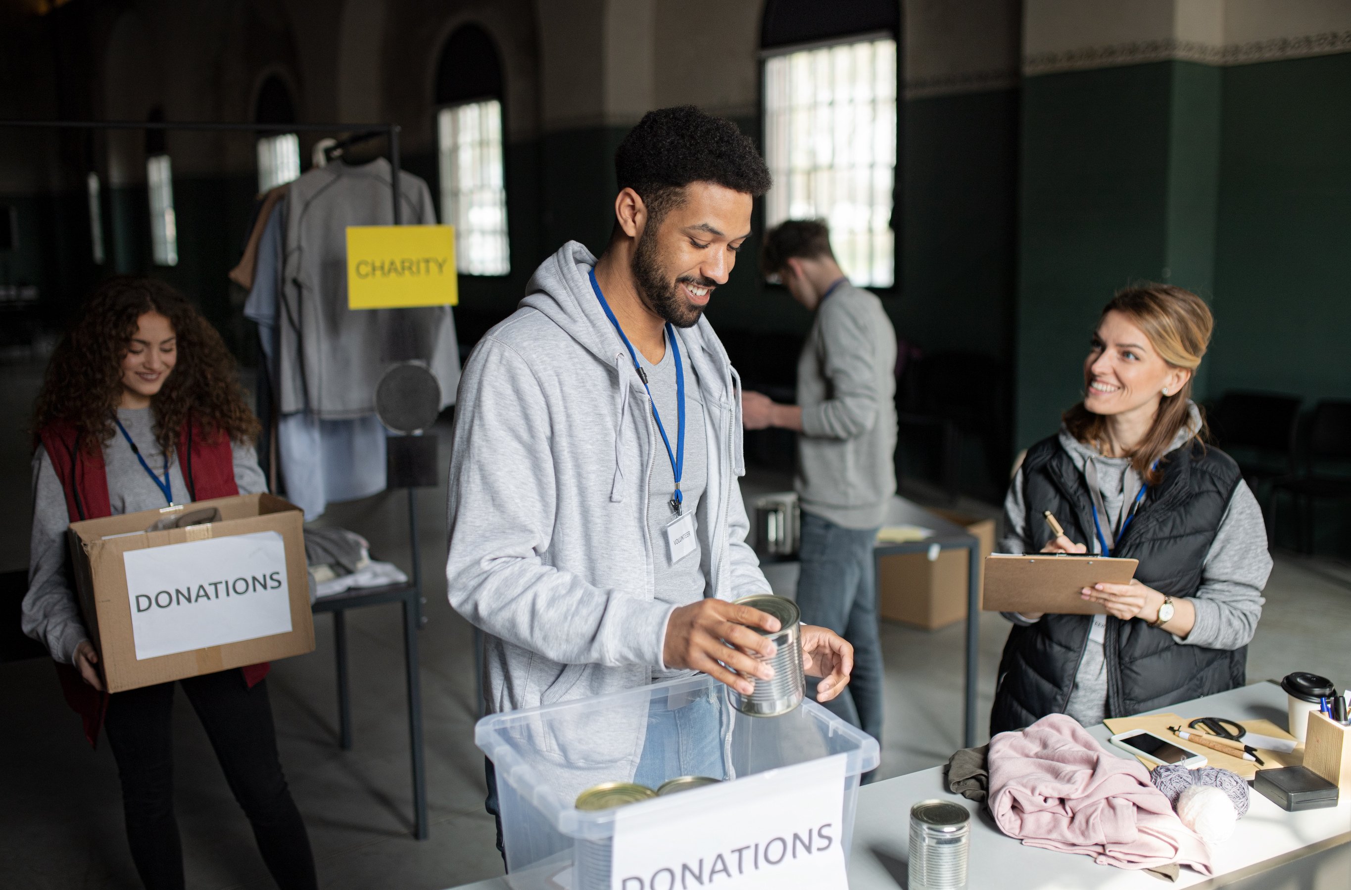 volunteers working in community charity donation centre