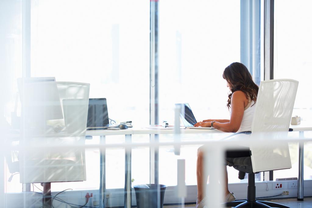 woman working alone in an office