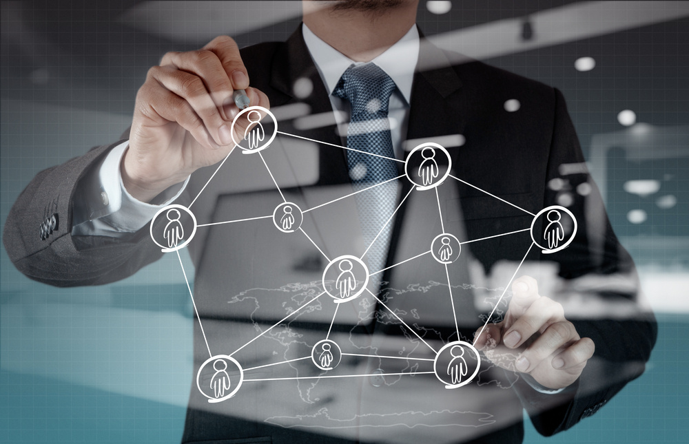 Businessman working with modern computer social network structure