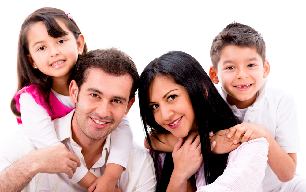 Happy family portrait - isolated over a white background